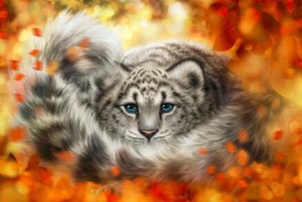 Image of diamond painting of a snow leopard cub in autumn leaves