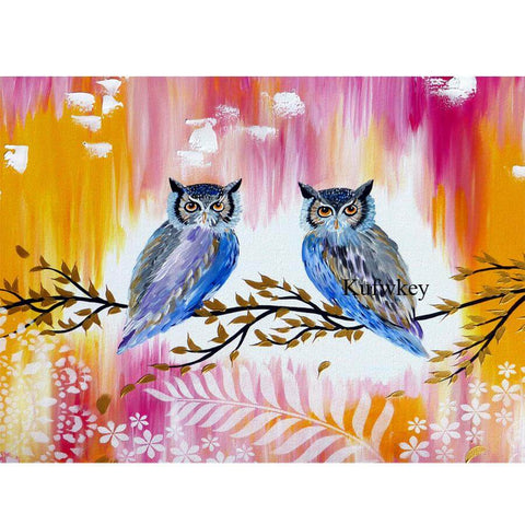 Image of Diamond painting of two owls together on a tree branch 