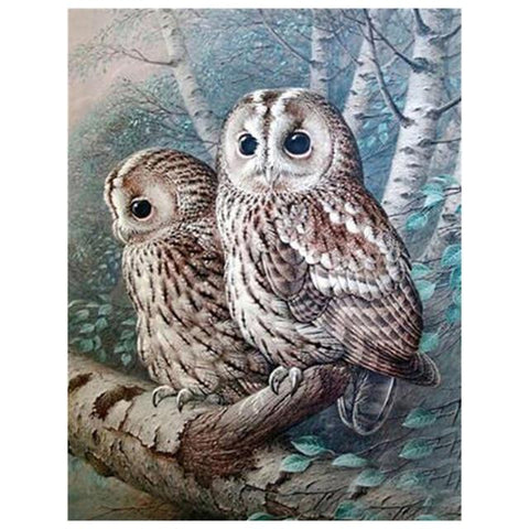 Image of Diamond painting of two snowy owls on a snow-covered branch