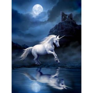 Diamond painting: a magical scene of a unicorn under the moonlight.