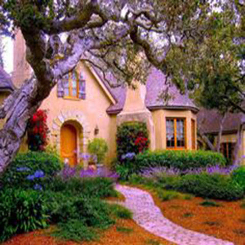 Image of Idyllic cottage landscape with a stone pathway and colorful flowers.