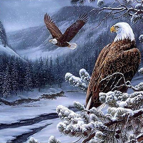 Image of Diamond painting of a majestic eagle perched on a snowy branch, overlooking a winter landscape