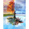 Diamond painting of a tree with four sections depicting each season: spring, summer, autumn, and winter.