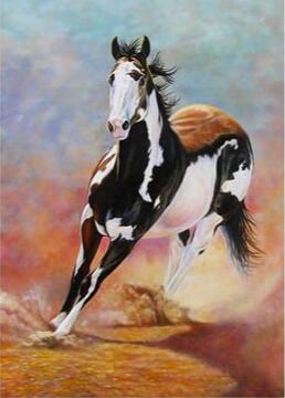 Image of Diamond painting of a black and white horse in full gallop, mane and tail flowing in the wind.