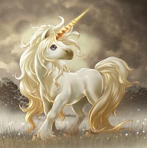 his diamond painting kit features a mythical white unicorn with a shiny golden horn.
