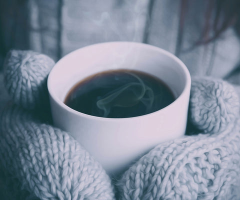 Image of Diamond Painting of a Cup of Hot Coffee in Knitted Gloves