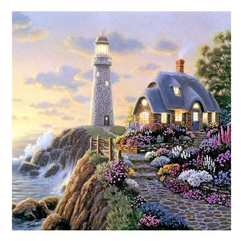 Image of Diamond painting of a lighthouse on a rocky cliff overlooking the ocean