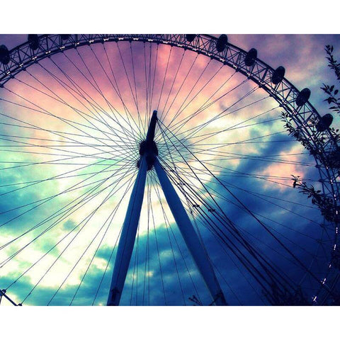 Image of A diamond painting of the London Eye at sunset, with a colorful sky and a silhouette of the structure.