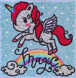 This diamond painting kit features a magical unicorn with a flowing mane and tail, leaping over a rainbow.