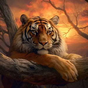 Diamond painting of a Tiger perched on a branch of tree during sunset.