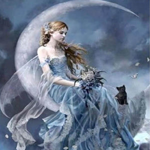 Diamond painting of a moon fairy sitting on a crescent moon.