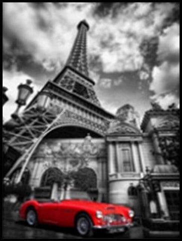 Image of Diamond painting of a classic red car parked in front of the Eiffel Tower in Paris.