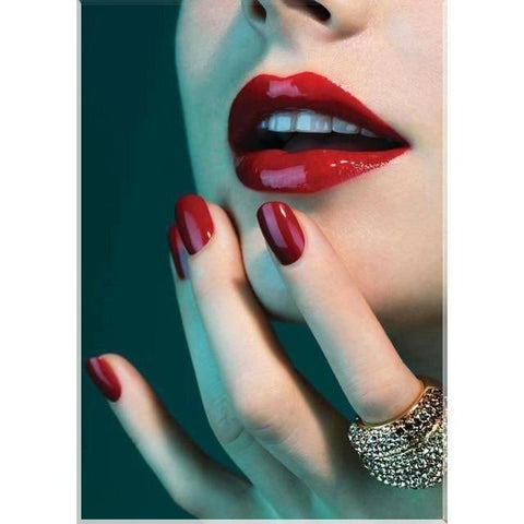 Image of Diamond painting of a woman's lips and nails painted in a vibrant shade of red.