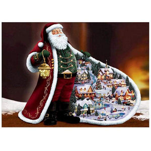 Diamond painting of Santa Claus showing a winter village scene on his coat.