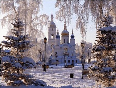 Diamond painting of a winter village scene with a church