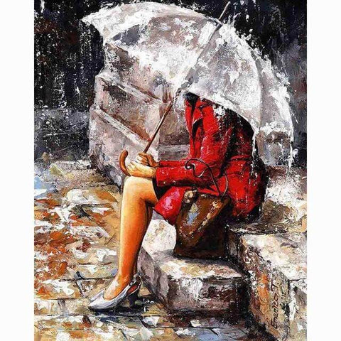 Image of Diamond Painting of a Woman in a Red Coat Sitting Under an Umbrella in the Rain