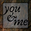 Diamond Painting of the Words 'You and Me' on a Wooden Background